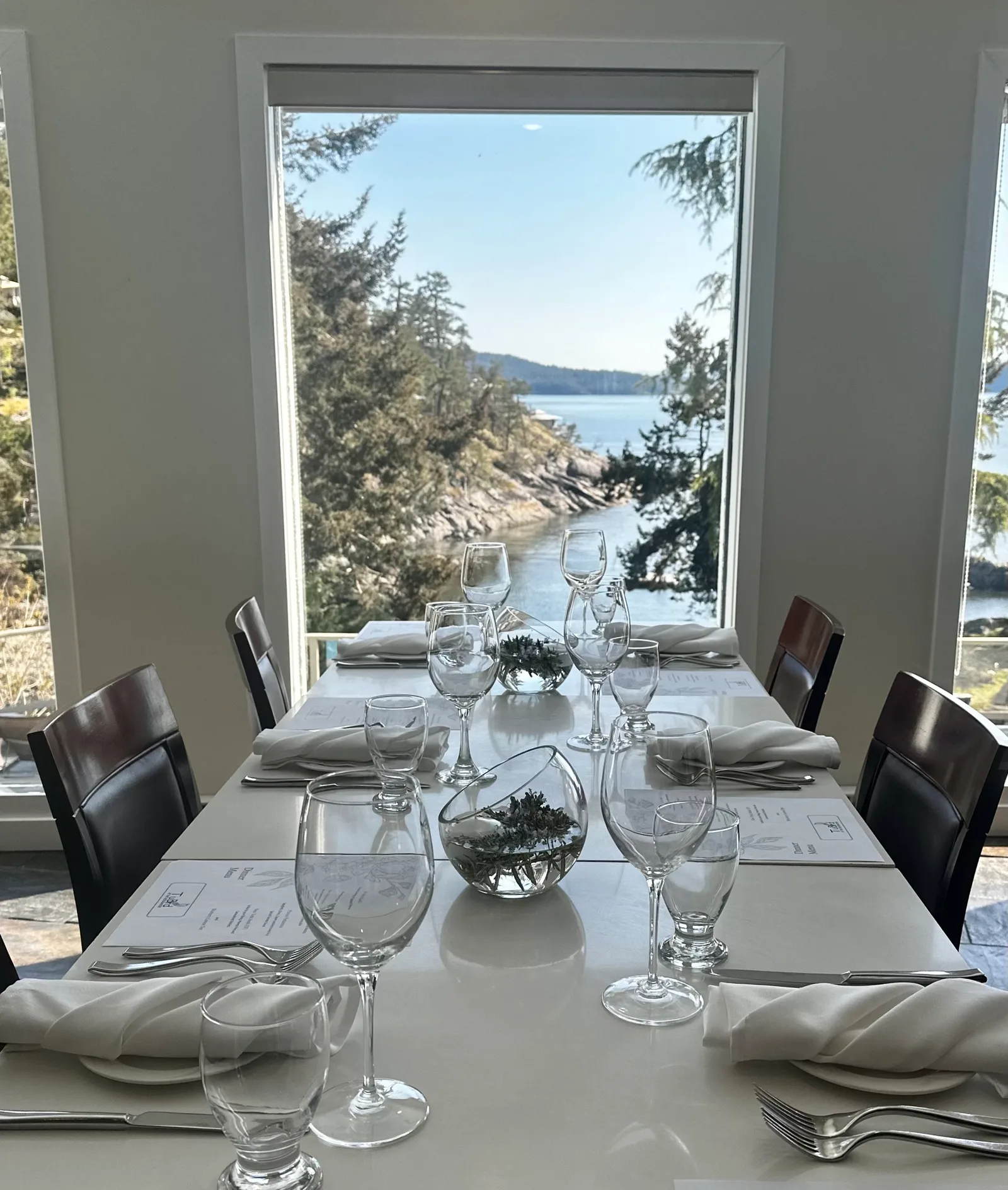 Panoramic view of the Rockwater Secret Cove Resort and Salish Sea coastline